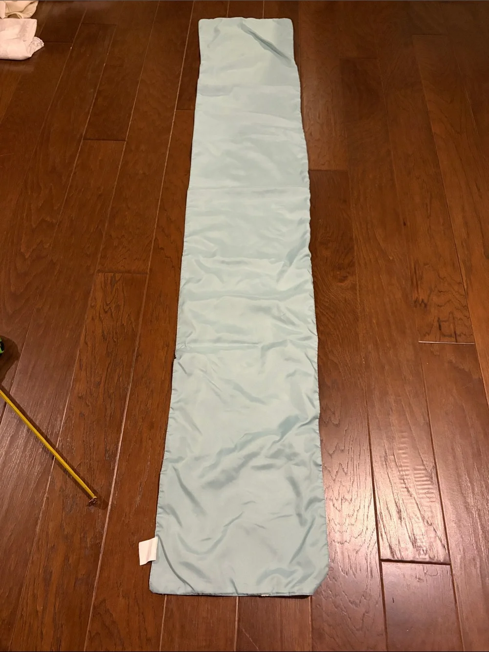 Beautiful Turquoise table runner with white embroidered flower scroll